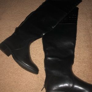 Knee high boots. Never worn. Black